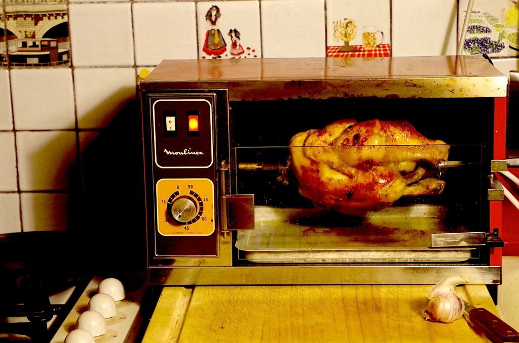 Chicken roasting in a moulinex rotisserie.
